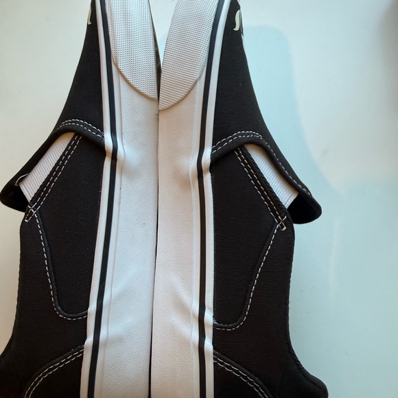 Vans Black Slip-Ons with White Floral Pattern